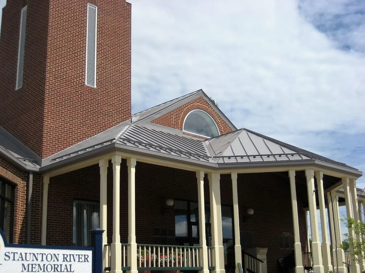 Skilled roofing craftsmen working on a residential roof in Westernville